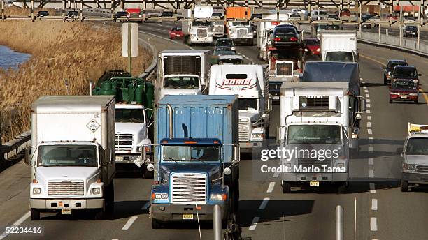 Trucks and cars drive down the New Jersey Turnpike February 23, 2005 in Elizabeth, New Jersey. According to the Clean Air Task Force, an average of...