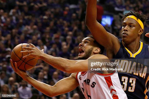 Toronto Raptors guard Cory Joseph makes one of his plays and goes hard to the hoop and gets the point despite close D by Indiana Pacers forward Myles...