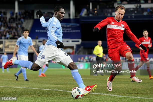 Kwadwo Poku, , NYCFC, has his shot blocked by Michael Harrington, Chicago Fire, during the New York City FC Vs Chicago Fire MLS regular season match...