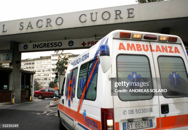 An ambulance arrives 24 February 2005 at the Policlinico Gemelli Hospital in Rome, where Pope John Paul ll was hospitalized earlier in the day with a...