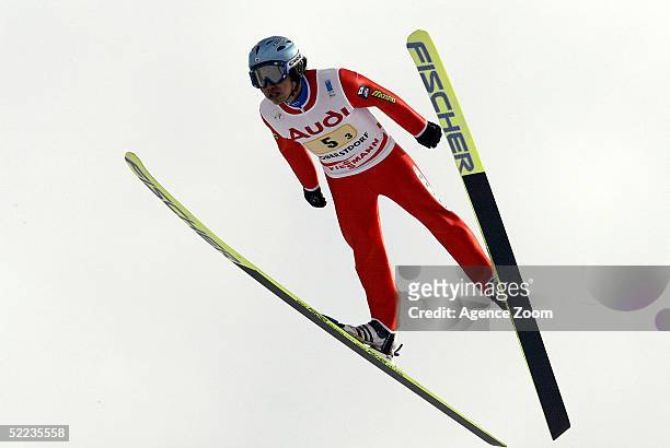 Takashi Kitamura of Japan jumps during the FIS Nordic World Ski Championships Men's Team 4 x 5 Km Combined event at the Llanglauf Arena on February...