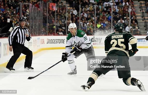 Colton Sceviour of the Dallas Stars controls the puck against Jonas Brodin of the Minnesota Wild during the second period of Game Three of the...