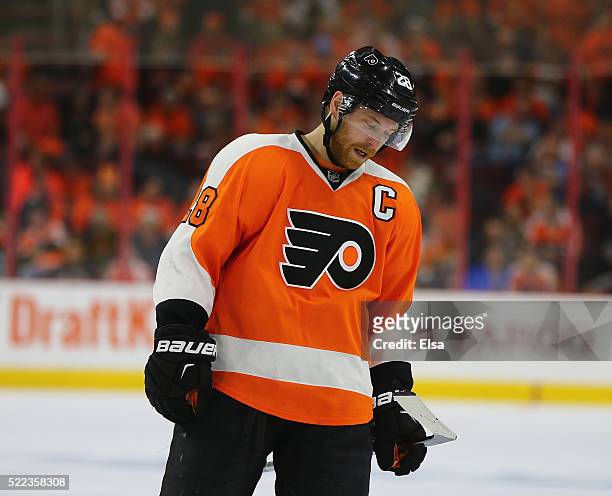 Claude Giroux of the Philadelphia Flyers reacts in the third period against the Washington Capitals in Game Three of the Eastern Conference...