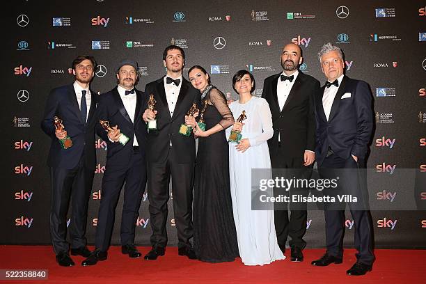 The cast and the crew of the movie 'Lo chiamavano Jeeg Robot' pose with their David di Donatello awards at the 60. David di Donatello ceremony on...