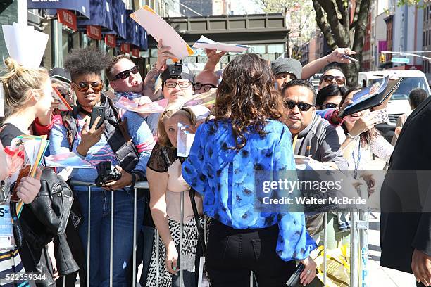 Idina Menzel greets fans as she arrives at the 2016 Tribeca Film Festival Tribeca Talks Storytellers: Idina Menzel at SVA Theatre on April 18, 2016...