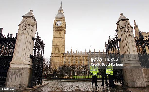 Police officers stand guard outside of Britain's Houses of Parliament on February 24, 2005 in London, England. The Prevention of Terrorism Bill will...
