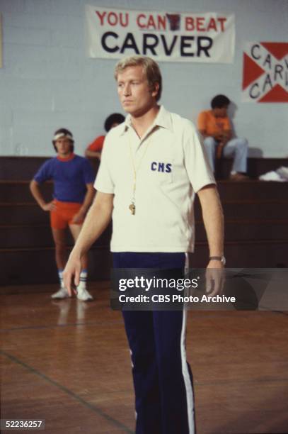 Film still from the CBS dramatic television series 'The White Shadow' shows American actor Ken Howard as he stands on a basketball court in a...
