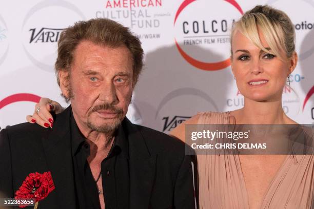 Johnny Hallyday and Laeticia attend the 20th annual COLCOA French Film Festival Opening Night at the Directors Guild of America in West Hollywood,...