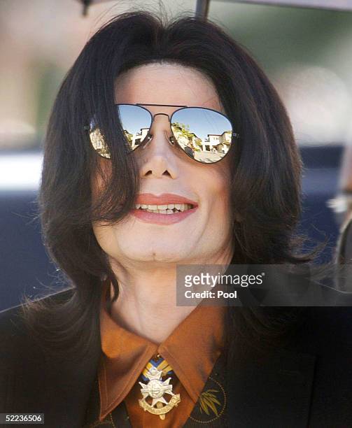 Singer Michael Jackson arrives at the courthouse during the jury selection phase of his child molestation trial February 24, 2005 in Santa Maria,...