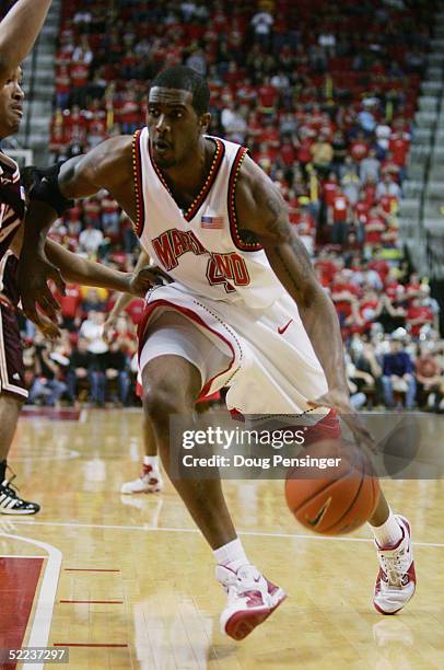 Travis Garrison of the Maryland Terrapins drives against the Virginia Tech Hokies during ACC Basketball action at the Comcast Center on February 8,...