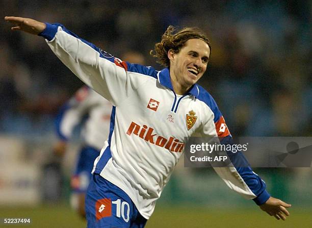 Zaragoza's Savio celebrates his goal against Fenerbahce during their UEFA football match in Zaragoza, 24 February 2005. AFP PHOTO/ LUIS ARMALE