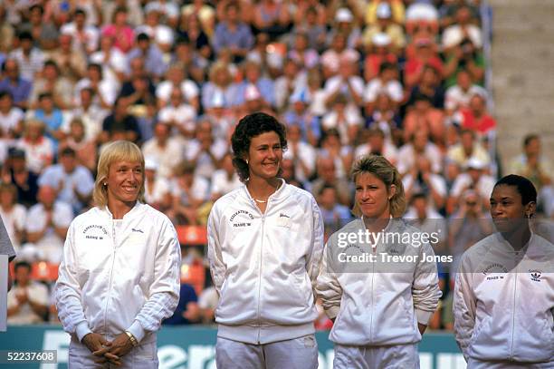 Women's Tennis team from left to right; Martina Navratilova, Pam Shriver, Chris Evert and Zena Garrison line up on the court during the 1986...