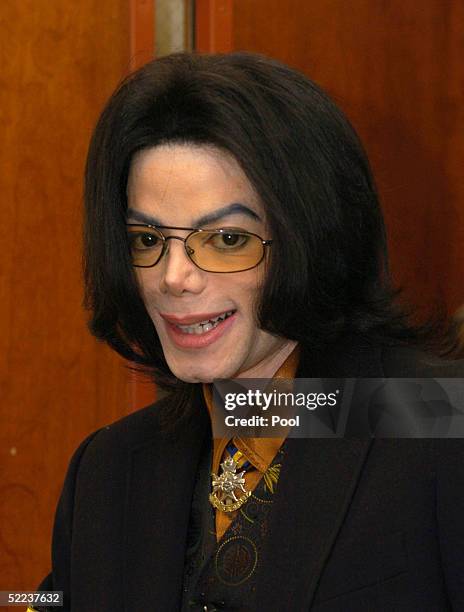 Michael Jackson leaves court after jury selection in his child molestation trial February 24, 2005 in Santa Maria, California. Along with the main...