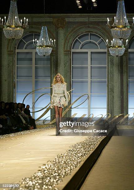 Model walks down the runway at Blumarine fashion show as part of Milan Fashion Week Autumn/Winter 2005/6 at Fiera di Milano on February 24, 2005 in...