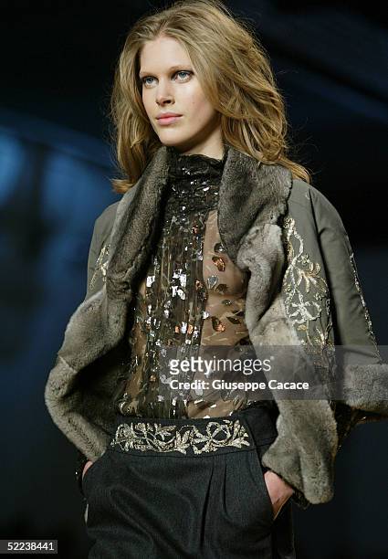 Model walks down the runway at Blumarine fashion show as part of Milan Fashion Week Autumn/Winter 2005/6 at Fiera di Milano on February 24, 2005 in...