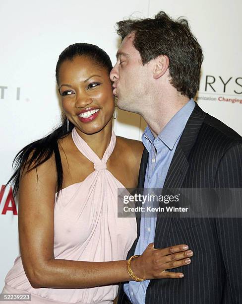 Actress Garcelle Beauvais-Nilon and her husband Mark Nilon arrive at "Vanity Fair Amped", a pre-oscar benefit for Chrysalis, at the Hollywood...