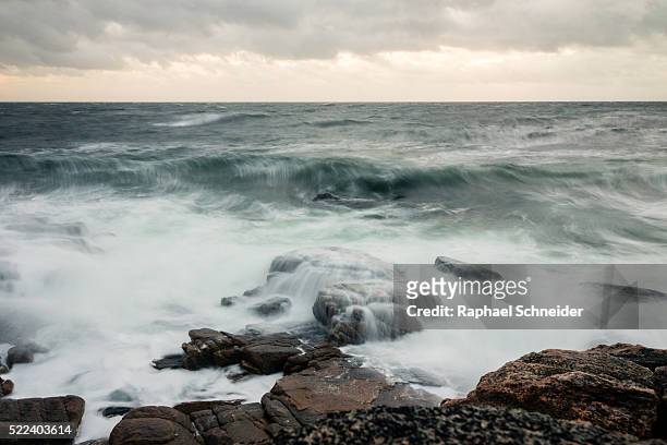long exposure of breakwater on rocky coast - kattegat sea stock pictures, royalty-free photos & images