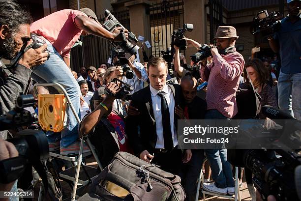 Convicted murderer Oscar Pistorius arrives in court for his appearance for a postponement of his sentencing hearing at the North Gauteng High Court...