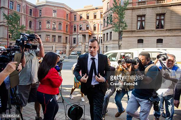 Convicted murderer Oscar Pistorius arrives in court for his appearance for a postponement of his sentencing hearing at the North Gauteng High Court...