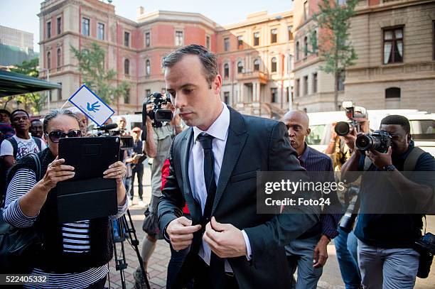 Convicted murderer Oscar Pistorius arrives in court for his appearance for a postponement of his sentencing hearing at the North Gauteng High Court...