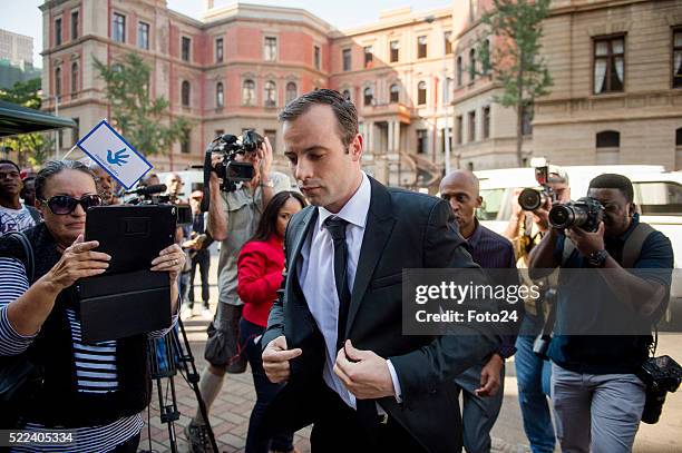 Convicted murderer Oscar Pistorius arrives in court for his appearance for a postponement of his sentencing hearing at the North Gauteng High Court...