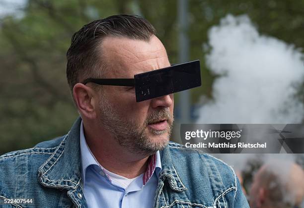 Lutz Bachmann, wearing black glasses, founder of the Pegida movement, arrives for the first day of his trial to face charges of hate speech on April...