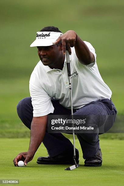 Vijay Singh of Fiji lines up a putt on the first hole during the second round of the WGC-Accenture Match Play Championships on February 25, 2005 at...