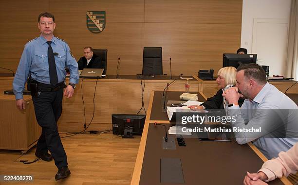 Lutz Bachmann, founder of the Pegida movement, and his advocate Katja Reichel, right, at the beginning of the first day of his trial to face charges...