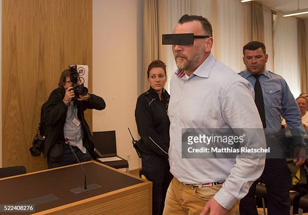 Lutz Bachmann, wearing black glasses, founder of the Pegida movement, arrives for the beginning of the first day of his trial to face charges of hate...