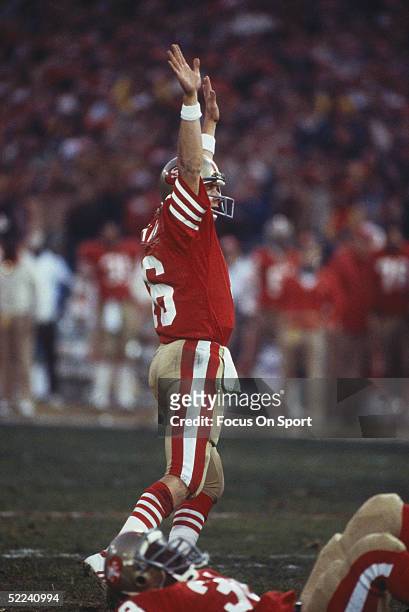 Joe Montana of the San Francisco 49ers celebrates against the Dallas Cowboys during the 1981 NFC Championship Game at Candlestick Park on January 10,...