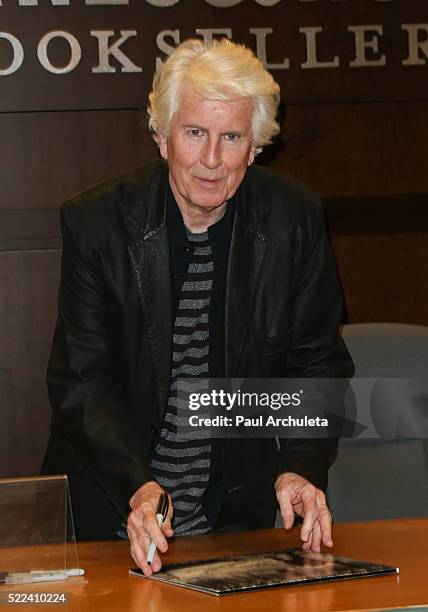 Musician Graham Nash signs copies of his new album "This Path Tonight" at Barnes & Noble at The Grove on April 18, 2016 in Los Angeles, California.