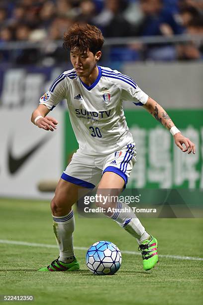 Sin Se-Gye of Suwon Samsung Bluewings FC runs with the ball during the AFC Champions League Group G match between Gamba Osaka and Suwon Samsung Blue...