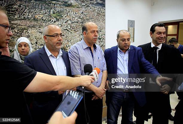 Hussein, the father of Mohammed Abu Khdeir along with Ahmad Tibi , parliament member of the Knesset , speaks to the press at Jerusalem court in...