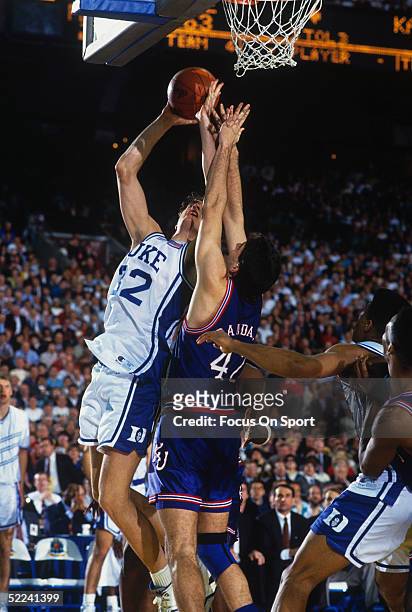 Duke's center Christian Laettner shoots at the net against Kansas during the NCAA Championship against Kansas in 1991. Duke defeated Kansas 72-65.