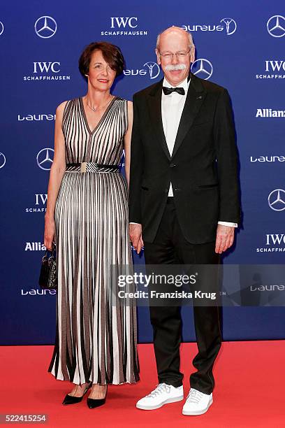 German businessman and the Chairman of the Board of Directors of Daimler AG Dieter Zetsche and his partner Anne attend the Laureus World Sports...