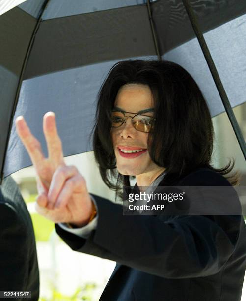 Michael Jackson leaving the Santa Barbara County Superior Court in Santa Maria, California, 25 February, 2005. Opening statements in the case could...