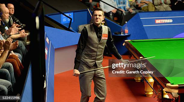 Mark Selby reacts after beating Robert Milkins during their first round match of the World Snooker Championship at Crucible Theatre on April 19, 2016...