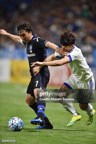 Yasuhito Endo of Gamba Osaka controls the ball during the AFC Champions League Group G match between Gamba Osaka and Suwon Samsung Blue Wings at the...