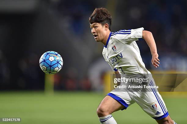 Lee Sang-Ho of Suwon Samsung Bluewings FC runs with the ball during the AFC Champions League Group G match between Gamba Osaka and Suwon Samsung Blue...