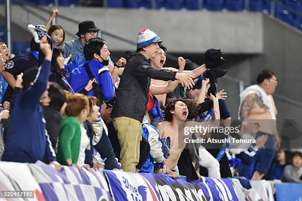 Fans of Suwon Samsung Bluewings FC cheer for their team during the AFC Champions League Group G match between Gamba Osaka and Suwon Samsung Blue...