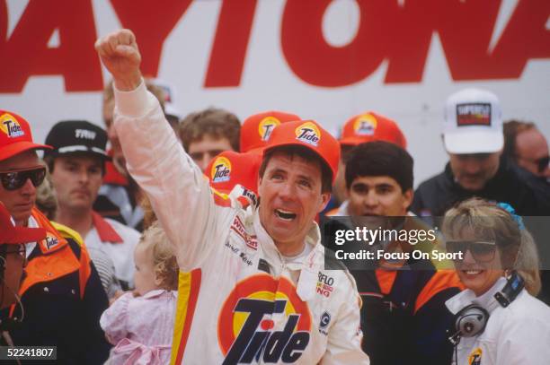 Darrell Waltrip celebrates with his Tide crew after winning the Daytona 500 at the Daytona Speedway on February 19, 1989 at Daytona Beach, Florida.