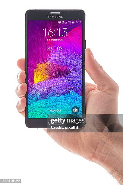 samsung galaxy note 4 smart phone - android phone stock pictures, royalty-free photos & images