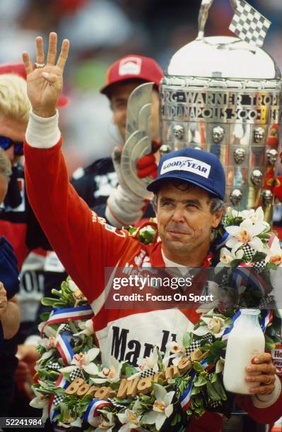 Rick Mears waves to the crowd after driving his Marlboro car to win the Indy 500 at the Indianapolis Motor Speedway on May 26, 1991 in Indianapolis,...