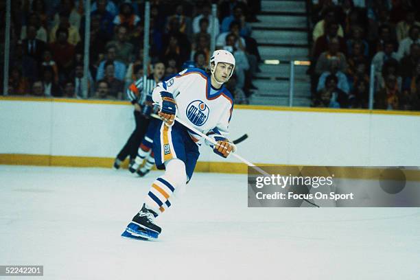 Wayne Gretzky skates for the Edmonton Oilers during a game.