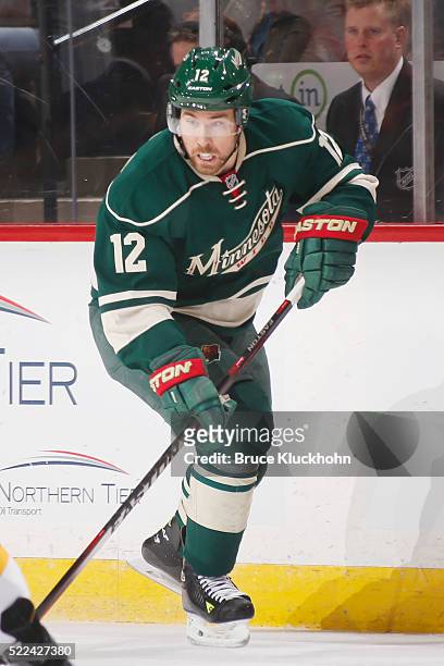 David Jones of the Minnesota Wild skates with the puck against the Calgary Flames during the game on April 9, 2016 at the Xcel Energy Center in St....