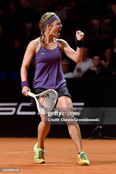 Laura Siegemund of Germany celebrates a point in her match against Anastasia Pavlyuchenkova of Russia during Day 2 of the Porsche Tennis Grand Prix...