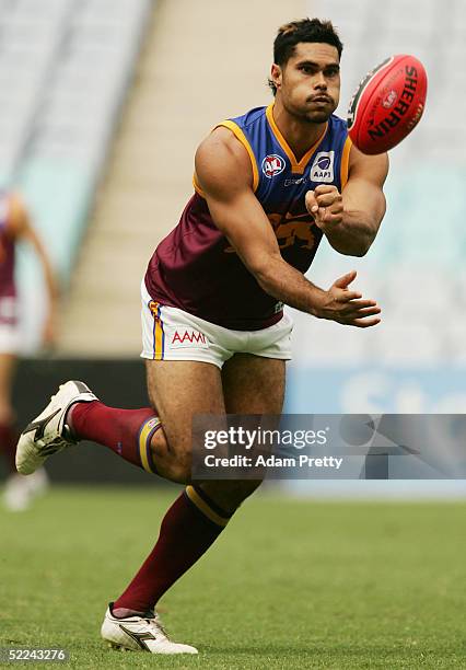 Mal Michael of the Lions in action during the trial AFL match between the Sydney Swans and the Brisbane Lions on February 26, 2005 at Telstra Stadium...