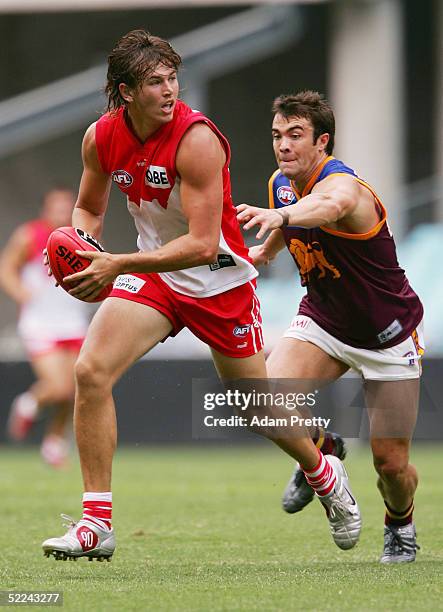 Mark Powell of the Swans in action during the trial AFL match between the Sydney Swans and the Brisbane Lions on February 26, 2005 at Telstra Stadium...