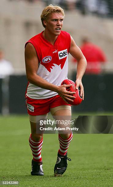 Tim Schmidt of the Swans in action during the trial AFL match between the Sydney Swans and the Brisbane Lions on February 26, 2005 at Telstra Stadium...