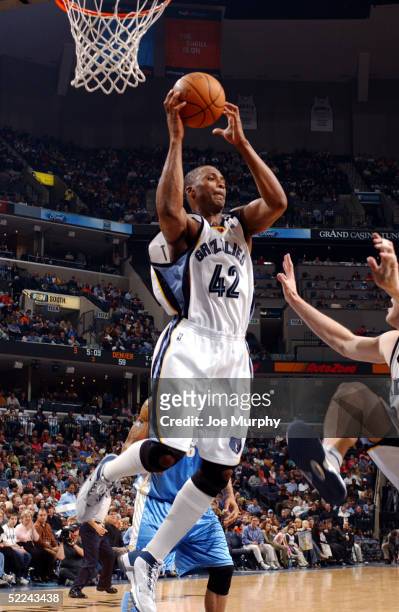 Lorenzen Wright of the Memphis Grizzlies grabs a rebound against the Denver Nuggets at FedexForum on February 25, 2005 in Memphis, Tennessee. NOTE TO...